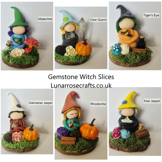 Six small handmade witch figurines arranged in a collage on a white background, each labeled with a gemstone name such as Malachite, Clear Quartz, Tiger's Eye, Dalmatian Jasper, Rhodonite, and Kiwi Jasper. Center text reads 'Gemstone Witch Slices' and 'Lunarroscrafts.