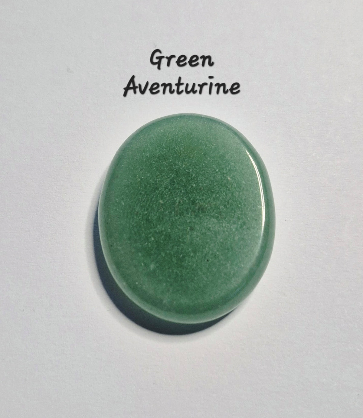 A polished oval green worry stone labeled 'Green Aventurine' on a plain white background.