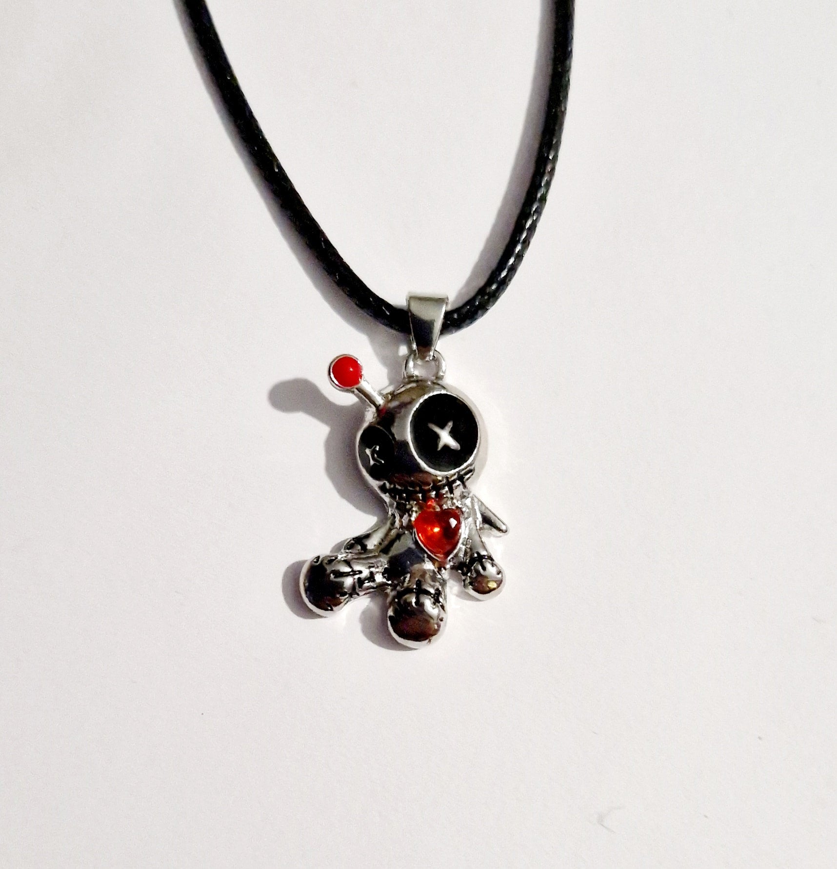 Voodoo Doll Pendant Necklace – A Touch of Mystical Mischief